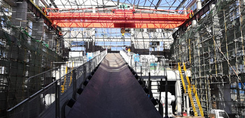 陜煤建設(shè)機電安裝公司承建的小保當(dāng)煤礦主斜井帶式輸送機膠帶展放工作順利完成