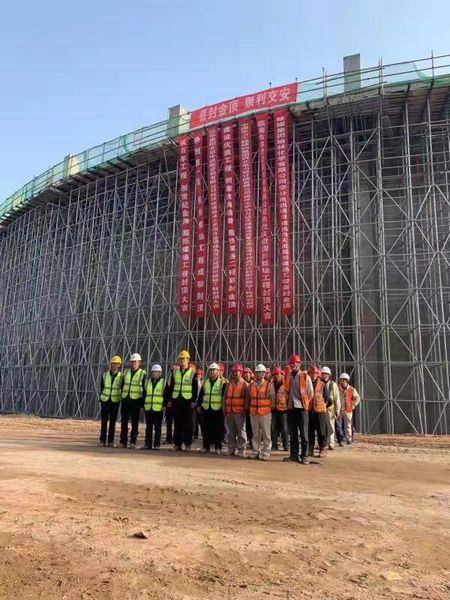 陜煤建設(shè)天工公司圓形煤場(chǎng)工程喜登金頂順利移交